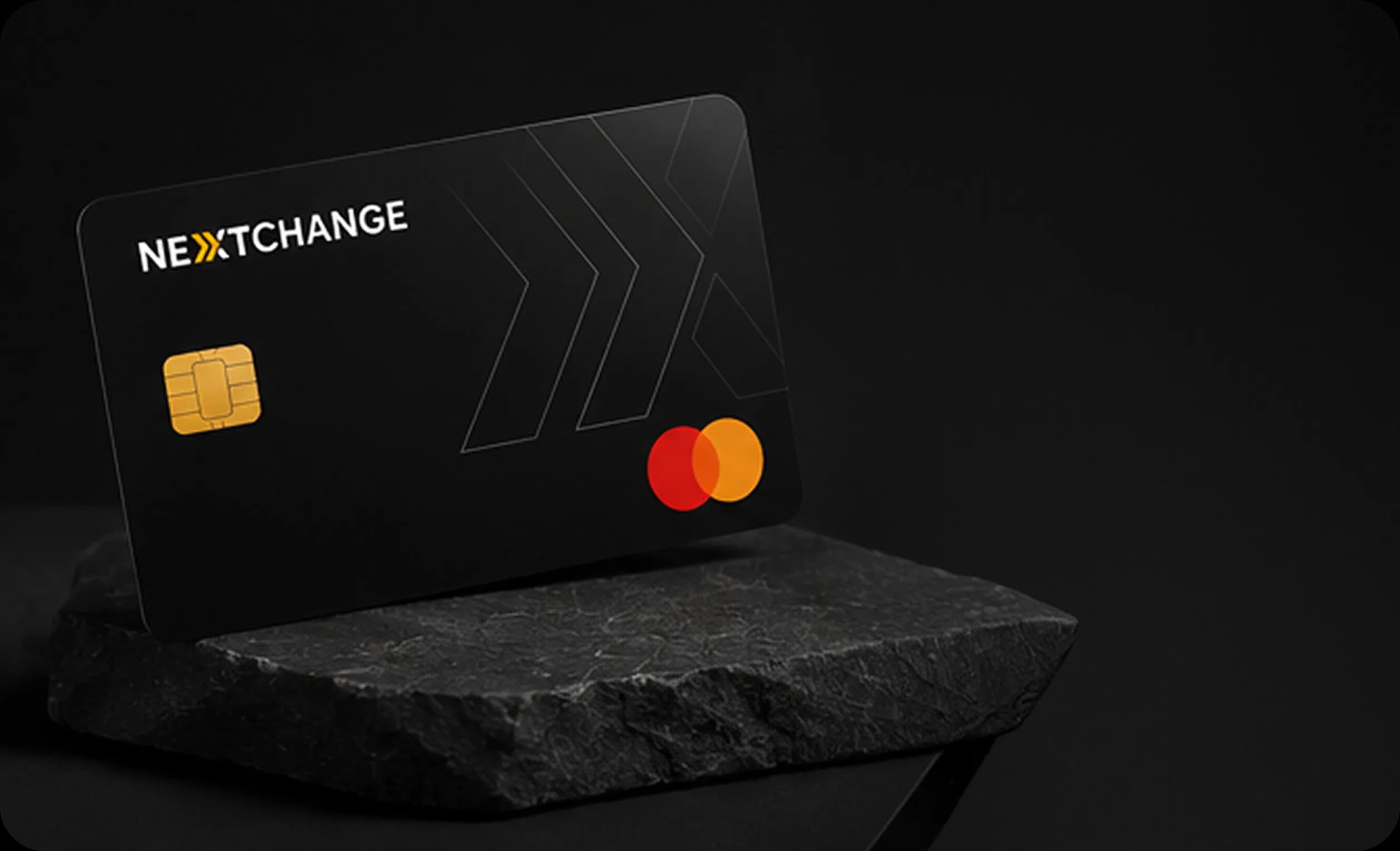 NextChange Mastercard resting on a stone surface